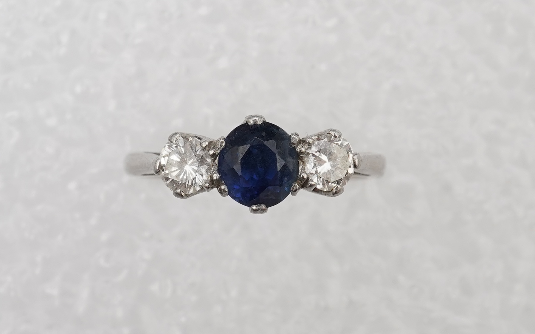 A sapphire and diamond ring
